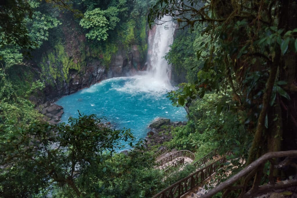 global-view-of-the-awesome-down-path-towards-the-rio-celeste-waterfall-in-costa-rica